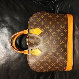 Authentic Louis Vuitton Alma handbag